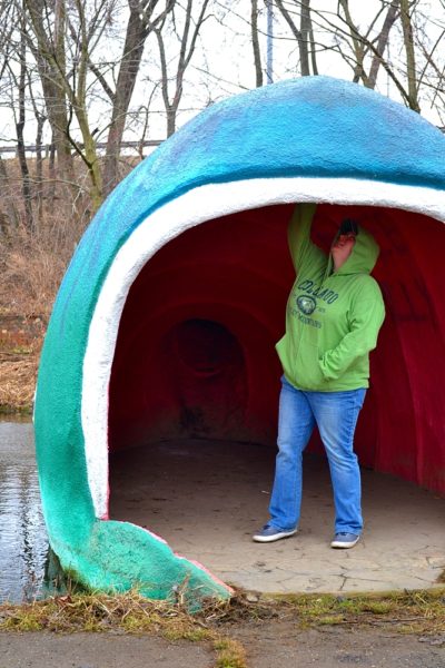 Jamie inside large whale mouth