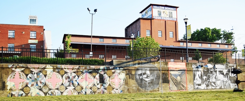 Murals on a low brick wall