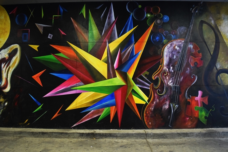 bright colored mural with a violin